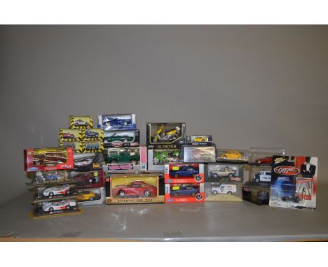 Good quantity of assorted diecast models, some 1:43 scale, mostly made in China. Boxed. Contained in two trays.