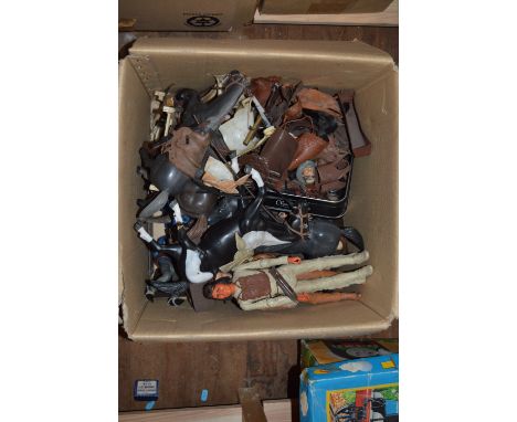 A quantity of action figures, horses and accessories including Marx Johnny West.