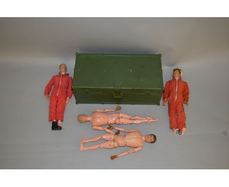 Four Palitoy Action Man figures together with a large quantity of clothing and accessories.