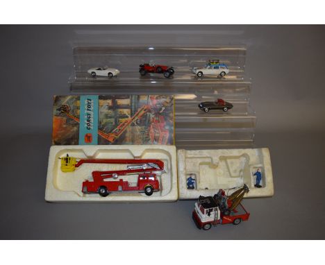 A boxed Corgi Toys 1127 Simon Snorkel Fire Engine, G in G box, a Holmes Wrecker with figures in polystyrene tray, lacking out