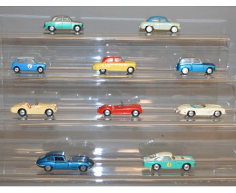 Ten unboxed Corgi Toys diecast model cars, including two tone versions of the Morris Cowley, Austin Cambridge, Vauxhall Velox