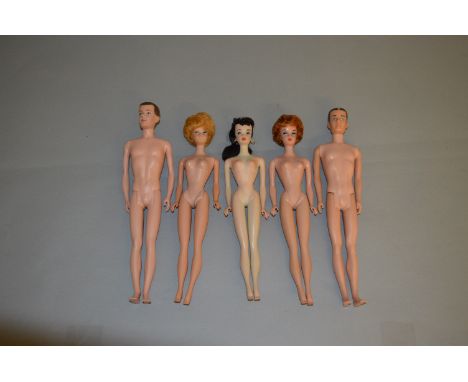 Five Mattel Barbie dolls: No. 3 Ponytail Barbie brunette; Bubblecut Barbie titian; Bubblecut Barbie white ginger (damage to c