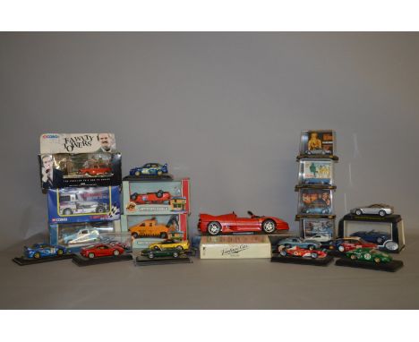 Quantity of boxed and unboxed diecast models by Corgi, Maisto and similar.