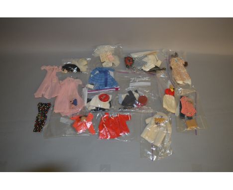 Good quantity of Mattel Barbie doll clothing from the early 1960s, to include: Apple Print Sheath Dress; Evening Splendour; P
