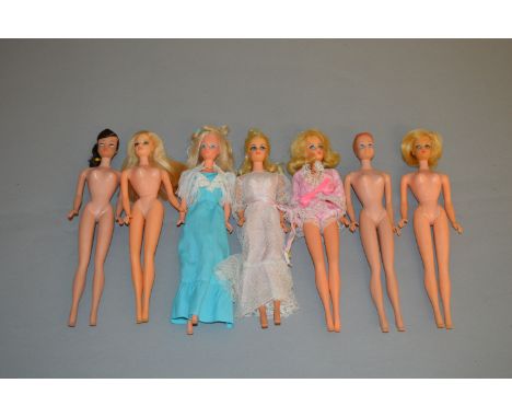 Seven Mattel Barbie dolls, including: Truly Scrumptious; Swirl Ponytail Barbie; Midge with a Fashion Queen style head; etc. T