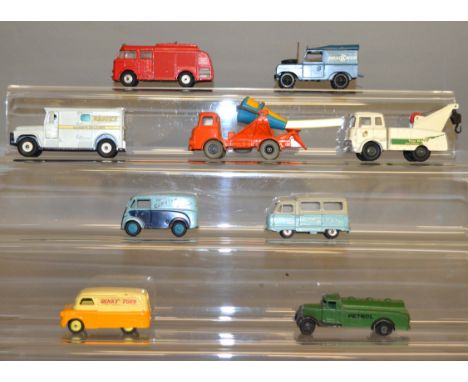 Eight  unboxed Dinky Toys diecast model cars, including a 465 'Capstan' Morris Van and a 434 'Top Rank' Crash Truck. Overall 