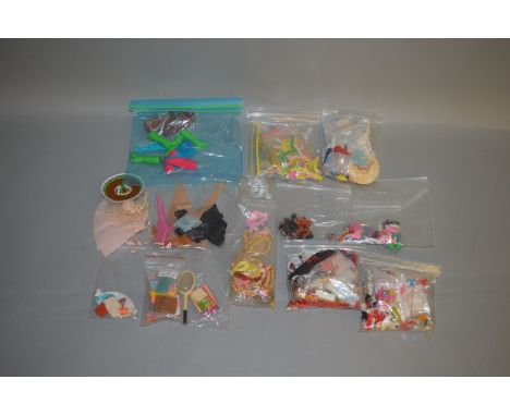 Very good quantity of Mattel Barbie accessories, includes: large quantity of shoes; hats; bags; jewellery; skis; coathangers;