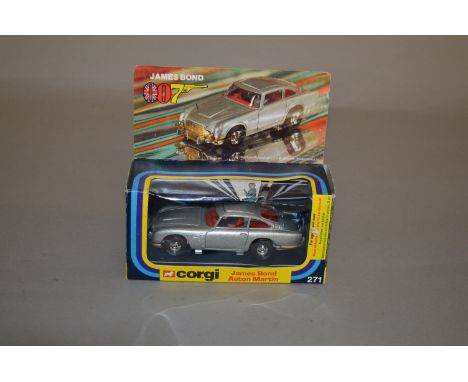 A boxed Corgi 271 James Bond Aston Martin, appears G+/VG in G+ box with some undulation to the card and plastic window of the