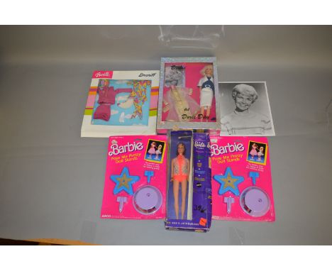 Quantity of Mattel Barbie items, all boxed/carded: La Barbie Que Habla; Barbie as Doris Day; Braniff outfit set; two Pose Me 
