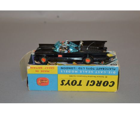 A boxed Corgi Toys 267 Batmobile with red 'bat' hubs, G+, on G plinth with inner packing piece and 'Secret Instruction' envel