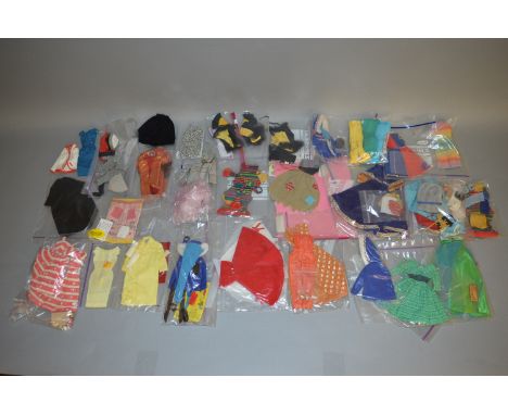 Good quantity of Mattel Barbie doll clothing, includes: Fun n Games; Benefit Performance; Astronaut; Red Riding Hood; Guineve