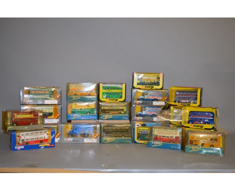 A quantity of boxed diecast models by Corgi, including a number of bus models. Contained in two trays.