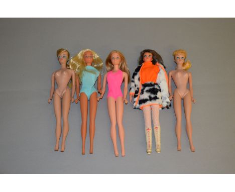Five Mattel Barbie dolls: blonde Ponytail Barbie; Swirl Ponytail Barbie; Dramatic New Living Barbie; Malibu Barbie; one other