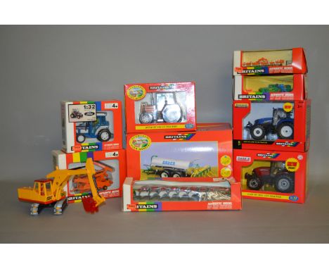 Nine boxed Britains 1:32 scale diecast agricultural models and implements, together with one unboxed model. (10)