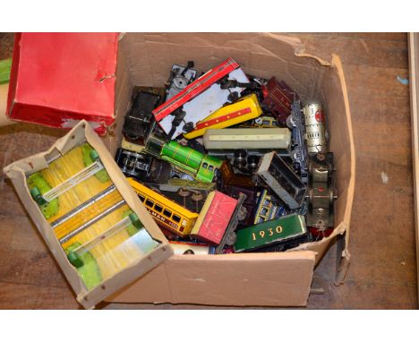 O gauge. Good quantity of rolling stock by English manufacturers including Hornby and Chad Valley. Unboxed, playworn.