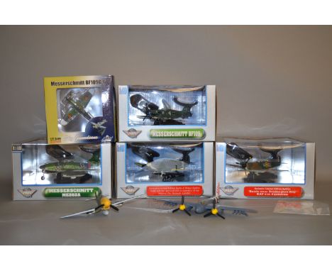 Five boxed diecast model aircraft: four Air Signature 1:48 scale; one Witty Wings. Together with two unboxed models. (7)