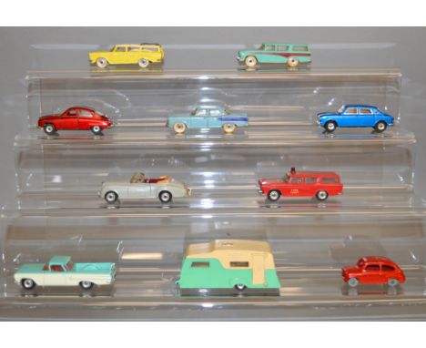 Ten unboxed Dinky Toys diecast model cars, including 171 Austin 1800 in metallic blue and a 449 El Camino Pick Up. Overall mo