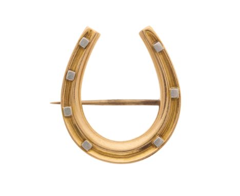An early 20th century 15ct gold bi-colour brooch, designed as a horseshoe, stamped 15 to reverse, length 2.6cm, 6gCondition- 