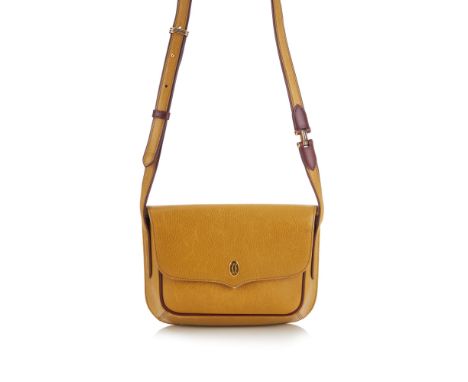 Cartier, a Must De Cartier crossbody flap handbag, designed with a grained mustard calf leather exterior with burgundy leathe