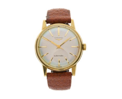 Longines, a 9ct gold automatic wrist watch, engine turned dial, reference 7006 1, signed automatic movement calibre 290, seri