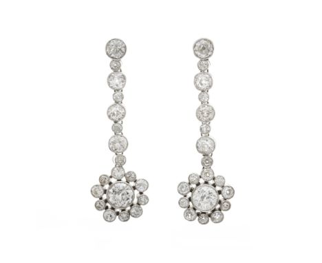 A pair of early 20th century old-cut diamond cluster drop earrings, with similarly-cut diamond articulated surmount, estimate