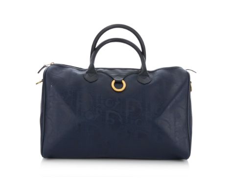 Christian Dior, a navy blue Boston bag, designed with a large Diroissimo patterned coated canvas exterior and smooth leather 