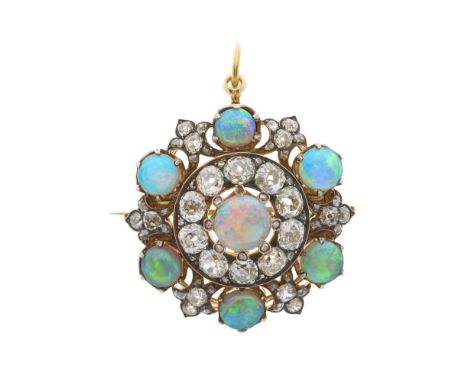 An impressive late Victorian gold and silver, opal cabochon and old-cut diamond openwork pendant, estimated total old-cut dia