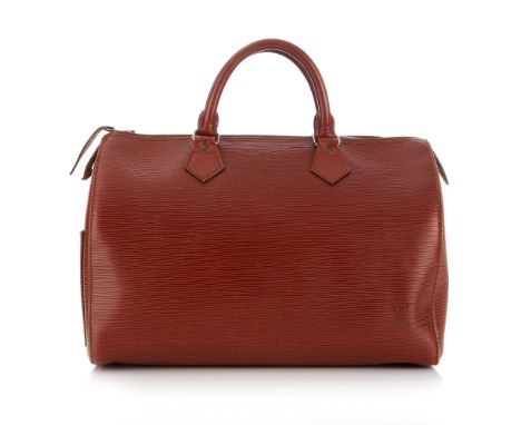 Louis Vuitton a tan epi Speedy 30 handbag, crafted from a tan textured epi leather with gold-tone hardware, featuring a patch
