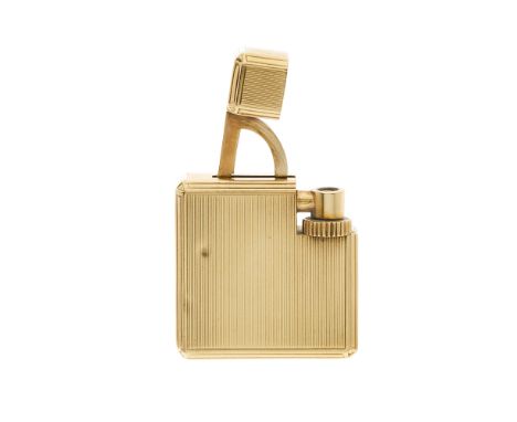 Cartier, a 1938 Art Deco 9ct gold petrol wick lighter, small square design, with an engine engraved, finely ribbed outer case