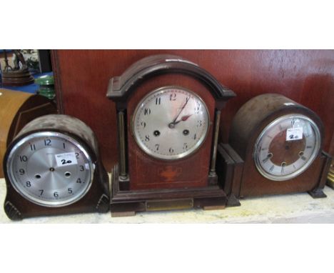 Early 20th Century inlaid mahogany two train mantel clock and two mid 20th Century oak mantel clocks. (3)