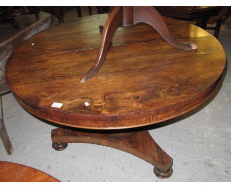 19th Century rosewood circular centre table on tripod base. CONDITION REPORT: Measurements 114 x 73 cm approximately