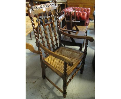 Early 20th Century oak barley twist armchair with cane seat.