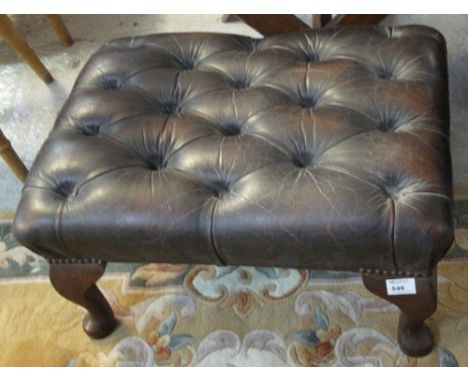 20th Century leather button back rectangular footstool on cabriole legs.
