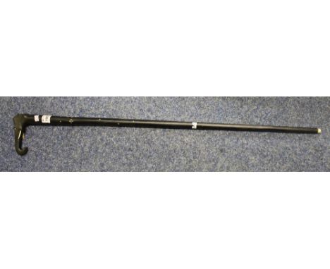 Ebonised gentleman's walking stick, having elephant head terminal.