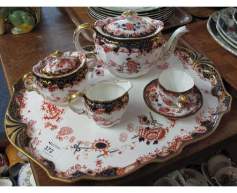 Royal Crown Derby 'Imari' design part teaware, to include: teapot; lidded two handled sucrier; milk jug; teacup and saucer on