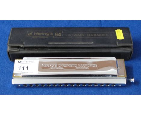 Hering's 64 professional chromatic harmonica in plastic case.
