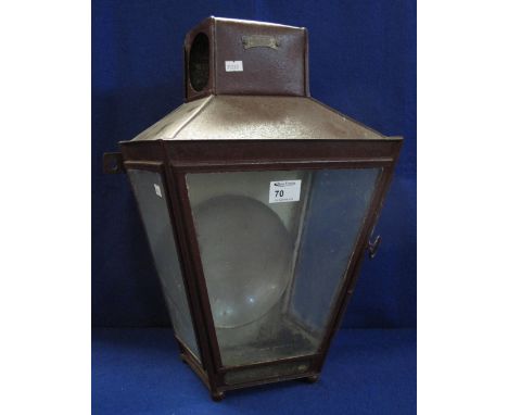 Wall mounted, lantern shaped outside light fitting.