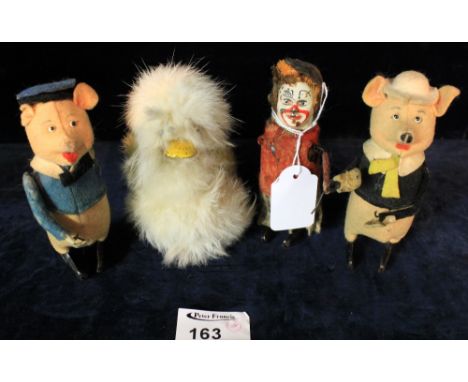 Four clockwork toys to include: 'Schuco', depicting pig, clown etc. (4)