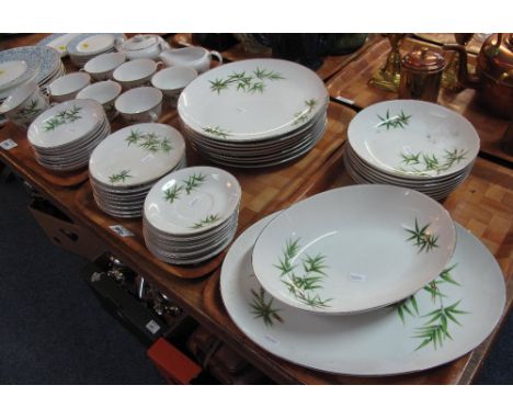 Three trays of Marutaki fine china tea and dinnerware on a white ground with bamboo decoration comprising teacups and saucers