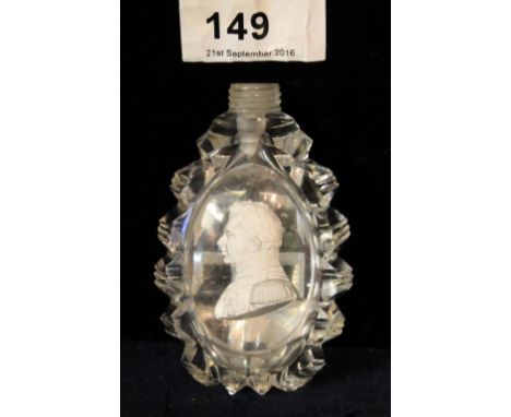 Glass scent bottle inset with profile portrait bust of an officer.