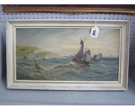 T. WEBB (English school) Seascape with Sailing Boats on a Shoreline, oil on board, signed lower right and dated (18)92, 22.5 