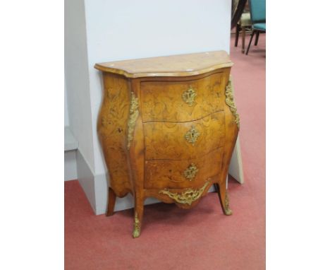 A XX Century Italian Serpentine Shaped Commode, crossbanded and with marquetry inlaid decoration to top, sides and drawers, w