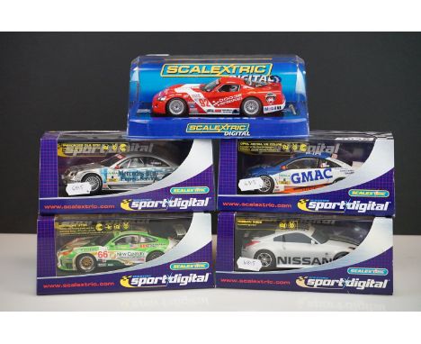 Five cased / boxed Digital Scalextric slot cars to include 4 x Sport Digital (C2664D Porsche 911 GT3R New Century No66, C2567