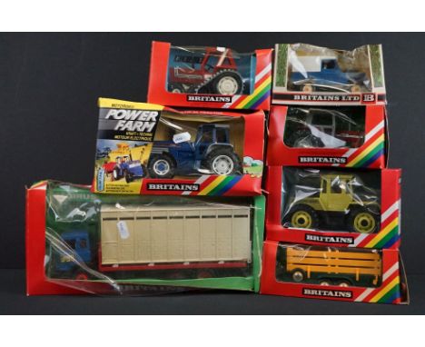 Seven boxed Britains farming diecast models to include 9321 Ford TW 35 Tractor, 9527 Fiat Half Track Tractor, 9529 Massey Fer