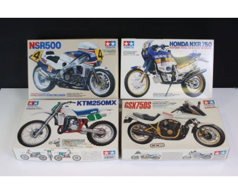 Four boxed Tamiya plastic model motorbike kits to include 14055 Honda NSR500 Grand Prix Racer, 14054 Honda NXR 750, 1434 GSX7