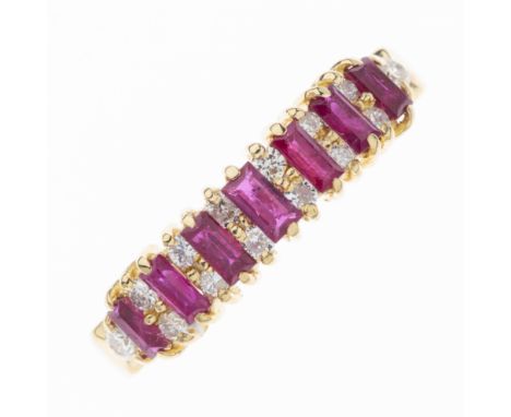 An 18ct gold ruby and diamond half eternity ring, estimated total diamond weight 0.30ct, hallmarks for London 1986, ring size