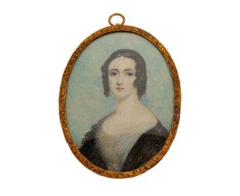 Friedrich Johann Gottlieb Lieder (German, 1780-1859), an early 19th century portrait miniature pendant, depicting a lady with