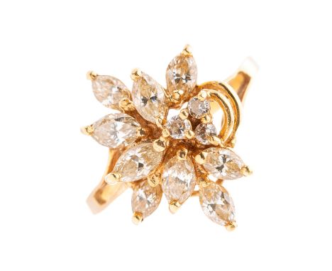 An 18ct gold vari-cut diamond floral dress ring, estimated total diamond weight 0.80ct, J-K colour, VS2-SI1 clarity, band sta