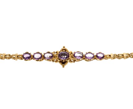 A late 19th century gold, amethyst bracelet, with engraved fancy-link sides and partially concealed push-piece clasp, 19cm, 2