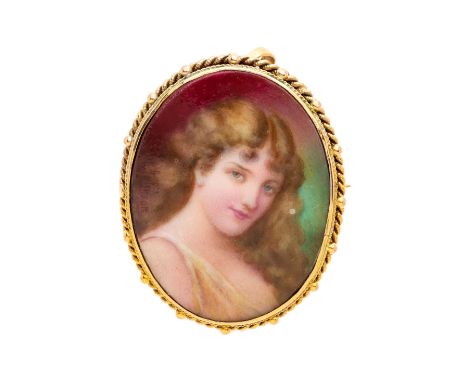 Leslie Johnson, an early 20th century 15ct gold portrait miniature pendant/ brooch, signed Leslie Johnson middle left, with e